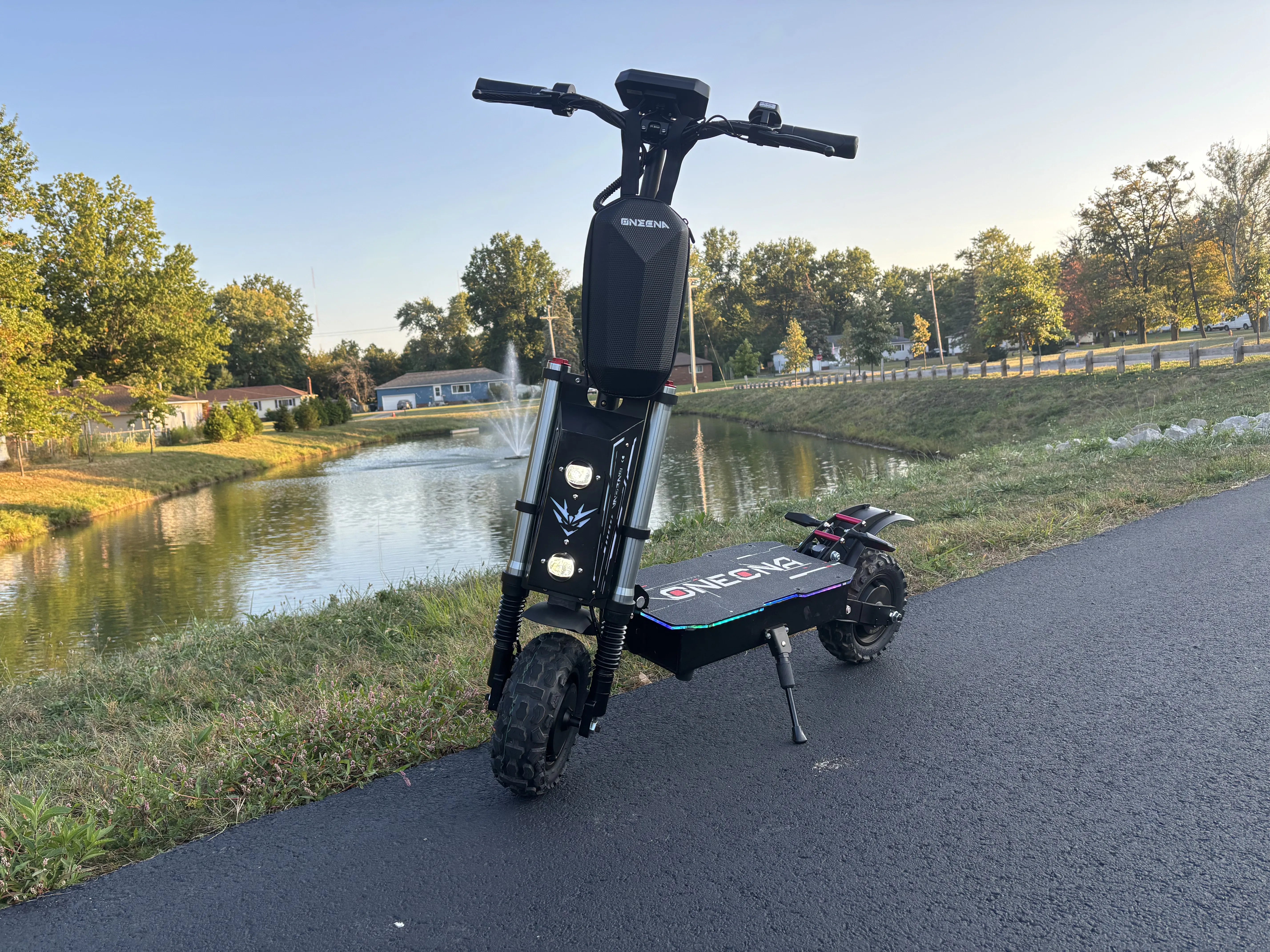 Adult rider on electric scooter commuting in California — e scooter laws 2026