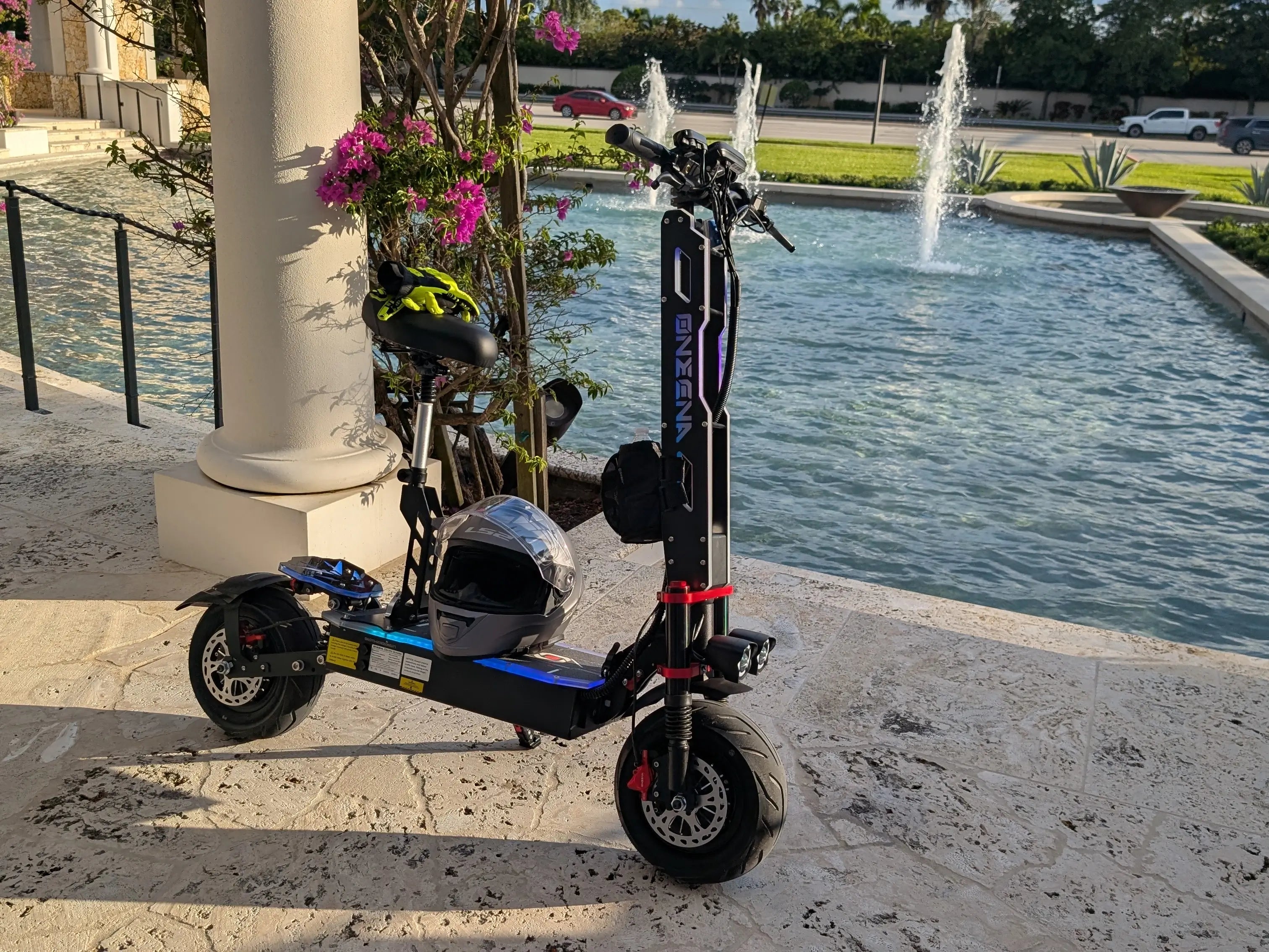 minor imperfections GT9 7000W electric scooter city ride with urban scenery